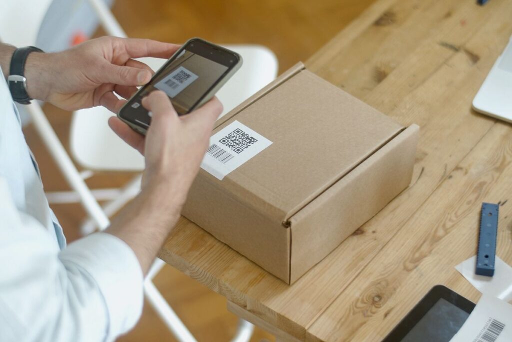 Shopify Afrique Mobile Money — scan QR code pour paiement mobile sur colis
